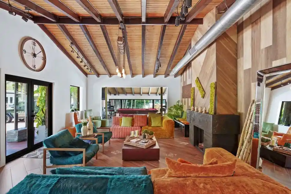 Casa Club great room under a timber-beamed ceiling