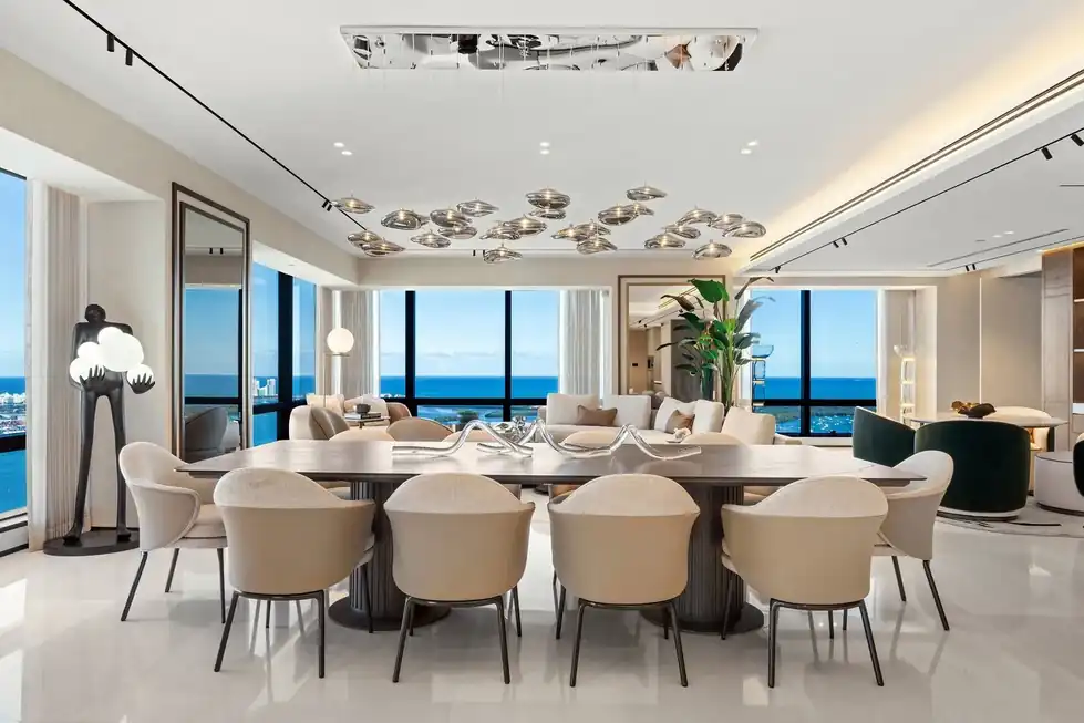 Lower PH66 dining room set for twelve beneath a sculpted ceiling