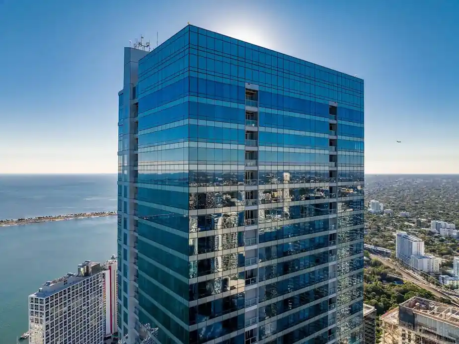 The Four Seasons Residences tower, home of Lower PH66, above Biscayne Bay
